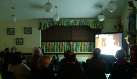 DVD projected onto large screen.